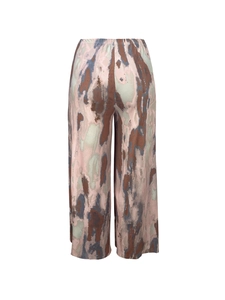 Close-up of abstract print ribbed fabric and elastic waistband on women wide-leg pants