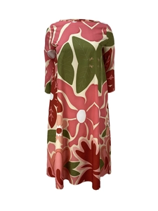 Detail of loose fit long sleeve dress with colorful abstract floral print pattern