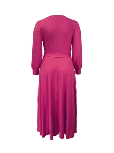 Detail view of the back of a deep pink V-neck maxi dress with gathered waist and elastic cuffs