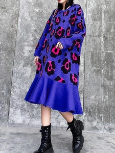 Deep purple long sleeve midi dress with abstract pink floral print and ruffled hem
