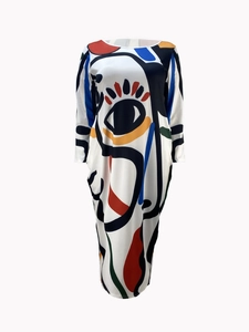 Detail view of the colorful abstract art print on white casual long sleeve dress