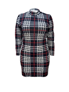 Detailed view of long sleeve bodycon dress with classic black and white plaid pattern