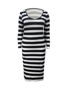 Detail of slim fit long sleeve dress featuring classic black and white horizontal stripes