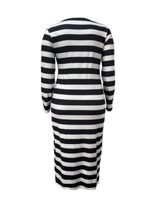 Detail view of the black and white horizontal stripes on a slim-fit V-neck knit dress