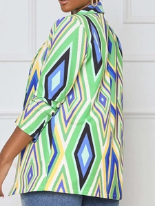 Detail shot of long-sleeved jacket featuring geometric diamond print and smooth texture