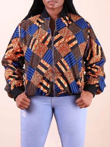 Close-up of African geometric print bomber jacket with zipper and ribbed trim details