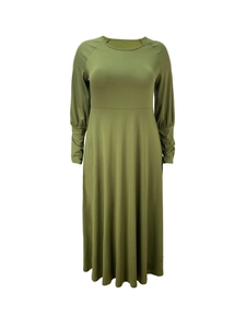Detail of olive green long sleeve dress featuring pleated hem and elastic cuffs