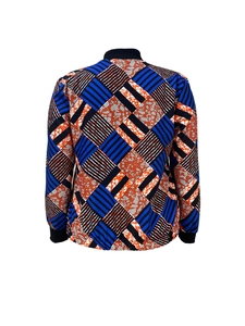 Back view detail of a vibrant bomber jacket featuring ethnic geometric print patterns