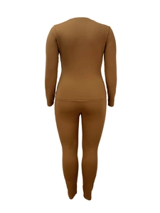 Rear view of brown long sleeve ribbed knit two piece set showing bodycon fit