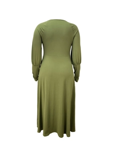 Detail showing the back of an olive green long sleeve dress with elastic cuffs and high waist