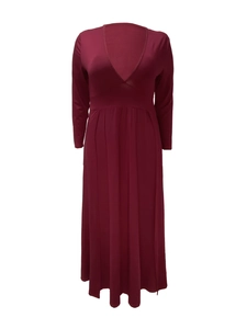 Detail view of wine red maxi dress featuring deep V-neck and elegant high-waisted pleated hem