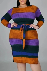 Detail of plus size tie-dye knit dress featuring long sleeves and side slit design