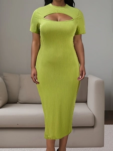 Detail of lime green short-sleeved dress with hollow-out neckline and ribbed texture
