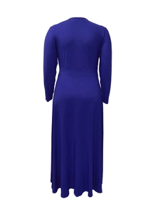 Detail of a deep blue V-neck maxi dress with long sleeves and a slimming waist seam