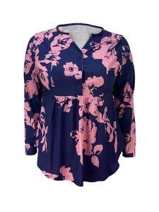 Detail view of pink floral print on navy long sleeve top with pleated high waist line