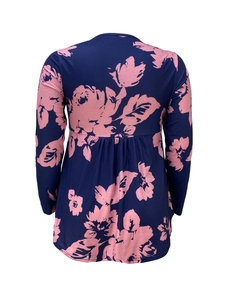 Detail view of floral print blouse showing back pleated high waist and navy fabric texture