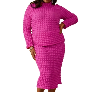 Magenta popcorn texture two-piece set featuring long sleeve top and midi skirt for women