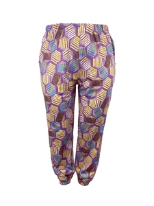 Detail of elastic waist and ribbed cuffs on purple trousers with geometric print