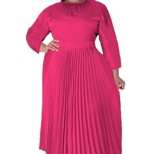 Elegant plus-size magenta pleated maxi dress with long sleeves and a belted waistline