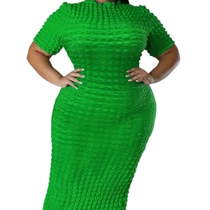 Slim fit bright green seersucker midi dress with short sleeves and bodycon silhouette