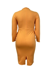 Rear view of orange long sleeve bodycon dress with back slit and invisible zipper