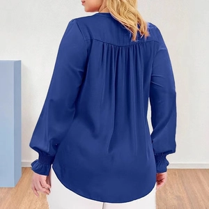 Royal blue satin long sleeve V-neck blouse with smocked cuffs and pleated back detail