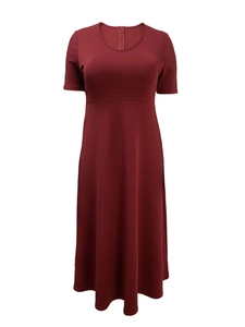 Macro detail of the dark red short-sleeve dress showing high-waist cut and fabric texture