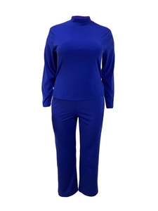 Detail of dark blue long-sleeve top and trousers set with smooth elastic fabric texture