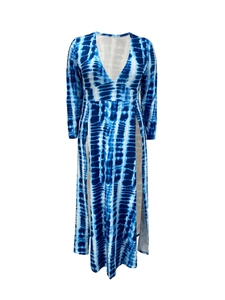 Detailed view of blue and white tie-dye dress with deep V-neck and high side slits
