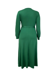 Detail view of the back of an elegant dark green long-sleeve maxi dress with waist tie