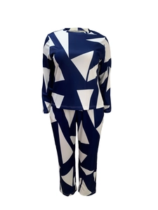 Detail of two-piece set featuring modern navy and white geometric triangle print