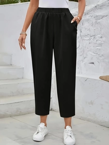 Women's casual high-waisted black wide-leg trousers with pockets and elastic waistband