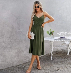 Detailed view of dark green V-neck dress with ruched waist and elegant A-line silhouette