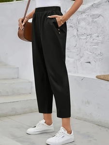 Women high waist black trousers with elastic waistband and gold buttons detailing