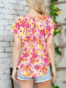 Women's summer V-neck floral blouse with ruffle short sleeves and casual curved hemline