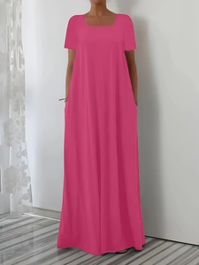 Detail of rose red maxi dress with square neckline and lightweight flowing fabric texture