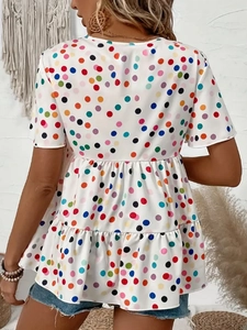 Women's summer white crew neck T-shirt with colorful polka dots and tiered ruffle hem