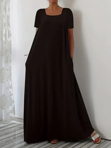 Women's minimalist black short sleeve maxi dress with round neck and side pockets