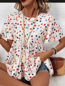 Women's summer white round neck top with colorful polka dot print and tiered ruffle hem