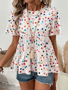 Women's summer casual round neck short sleeve t-shirt with colorful polka dot print and ruffle hem