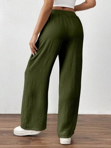 Detailed back view of olive green wide-leg trousers with elastic high waist and pleated texture