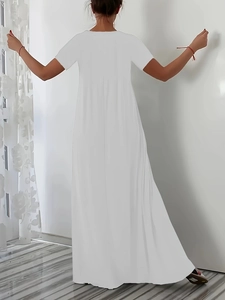 Detailed back view of a loose white V-neck maxi dress with lightweight fabric texture