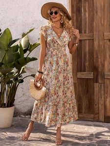 Floral V-neck summer dress with elastic waist and ruffle sleeves for a bohemian beach look