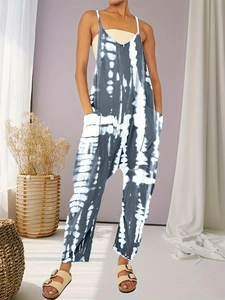 Women's summer tie-dye jumpsuit with thin straps and side pockets in a relaxed fit