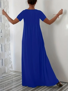 Back view of a minimalist royal blue short sleeve maxi dress with a relaxed loose fit