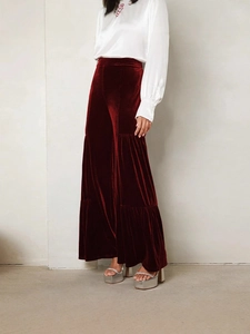 Women's burgundy velvet wide-leg trousers with elegant tiered layered design