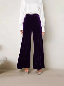 Women's deep purple velvet wide-leg trousers with elegant high waist and tiered details