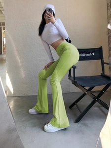 Women's high waist flared rib-knit pants in lime green with a slim fit casual design