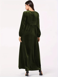 Detailed back view of dark green velvet maxi dress showing elegant drape and texture
