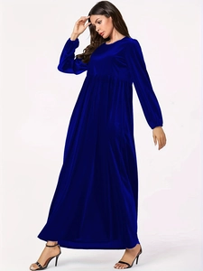 Detail of elegant royal blue velvet dress with round neck and high waist pleats